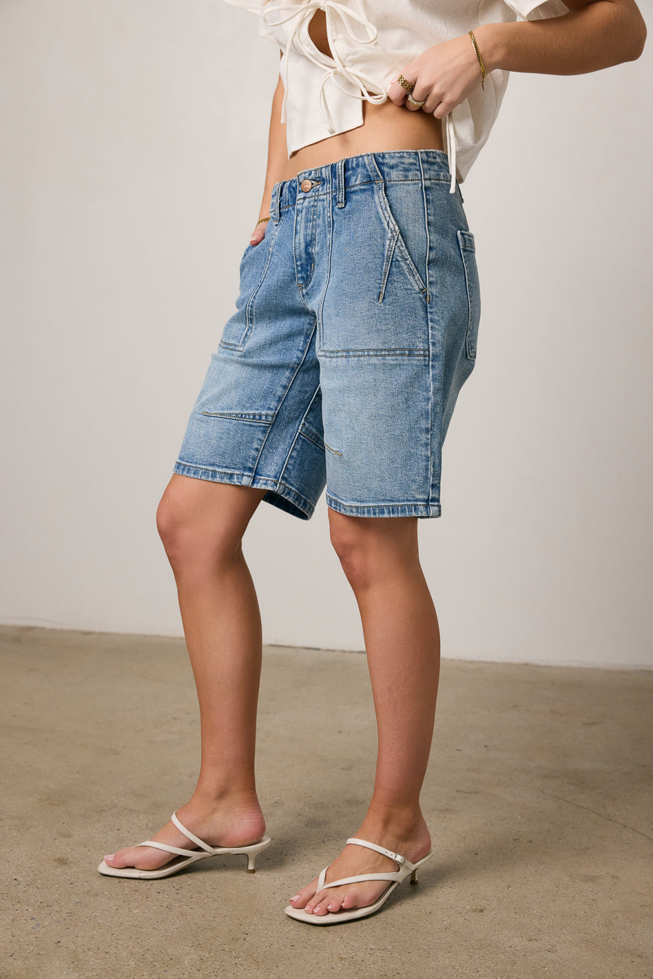 Ally Mid Rise Denim Shorts in Medium Wash